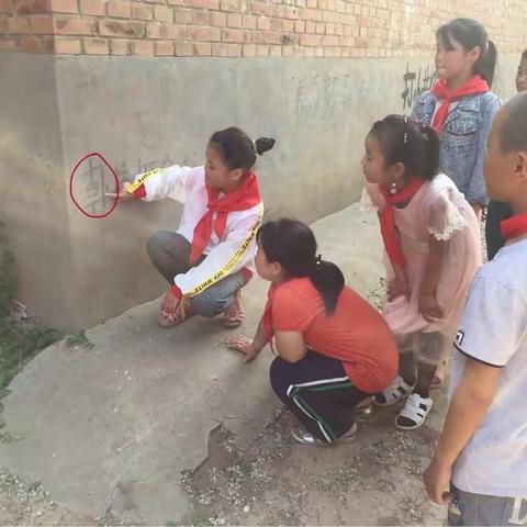 王村乡三联小学少先队员“啄木鸟行动 ”纠错字实践活动