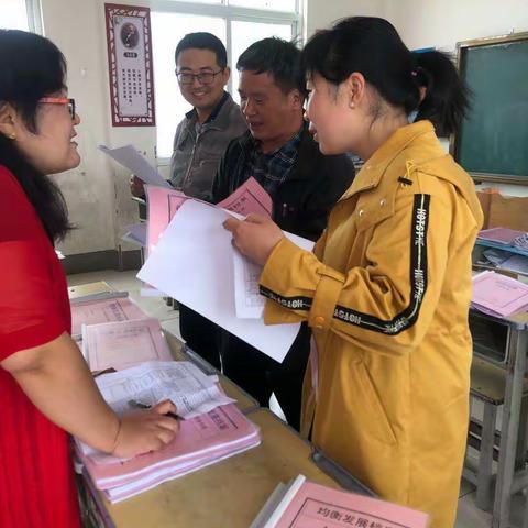 【观摩学习找问题，督促落实备迎验】王岗乡中心校观摩检查均衡迎验档案建设情况