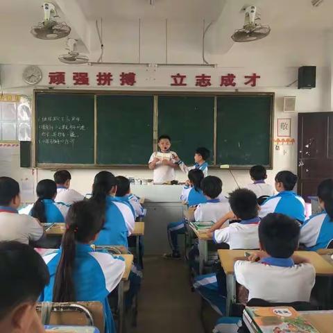 走近诗歌  领略诗歌魅力——屯昌县新兴镇新兴中心小学走近诗歌主题活动