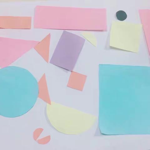 科学：《图形娃娃来拼物品》