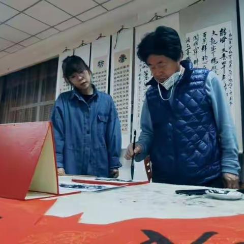 以“艺”抗疫   翰墨迎春——黑龙江省画院绘画艺术研究院画家为抗疫一线社区工作人员送春联