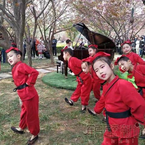 【樱花树下的约定】淇滨区嵩山小学二一班参加第五届鹤壁樱花文化节演出纪实