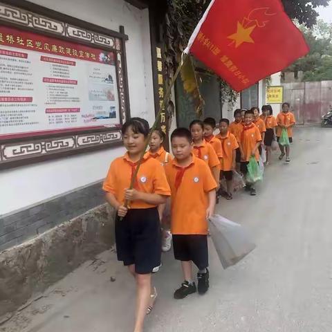 保护环境  从我做起——河小五(1)班太阳花中队“红领巾进社区”实践活动