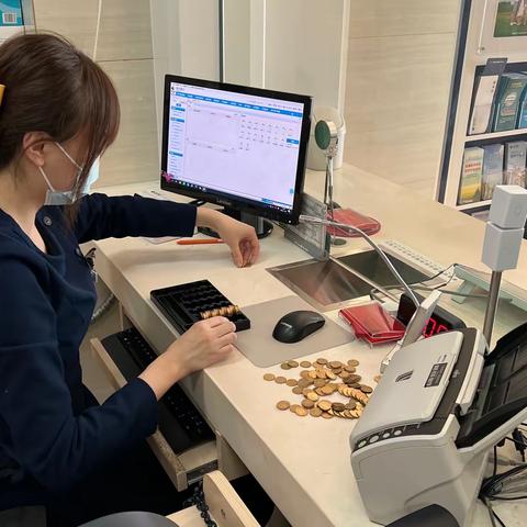 银行服务无小事 硬币兑换暖人心