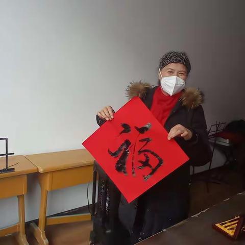 阳光社区开展“迎新春 写春联 送祝福”万福进万家活动