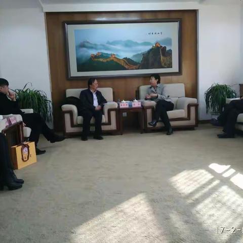 陈弘区长会见上海豫园商城有限公司总裁梅红健一行