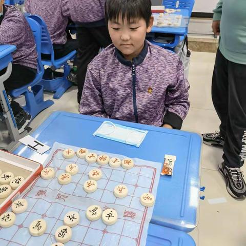 文化传承，陶冶性情，启迪智慧------记大港第十二小学六年级课后服务个性化课程《中国象棋》阶段性评价“擂台赛”
