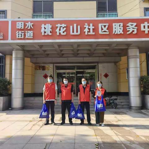 第四党小组开展“红丝带”关爱行动           ----宣传艾滋病防治知识