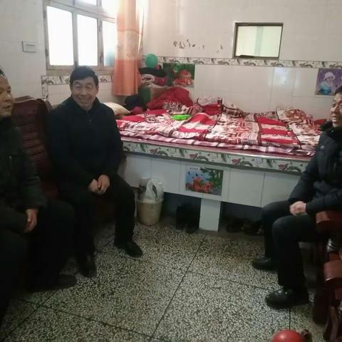 新春送祝福，温情暖人心                          ――西岩放坊初级中学慰问困难教职工及退休老教师纪实