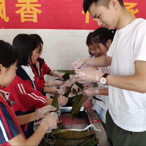 明伟小学端午粽飘香，传承爱国情端午节主题活动