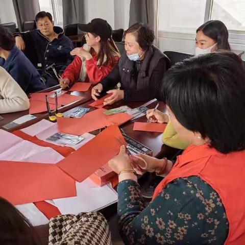 水稻乡开展"巾帼展巧手，剪纸庆三八"活动