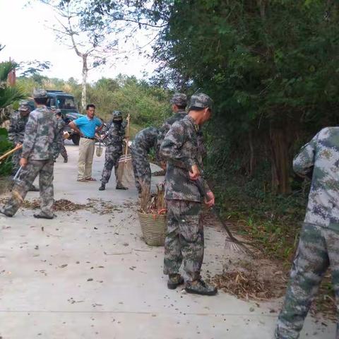 迎国检,民兵在坡村卫生整治行动.