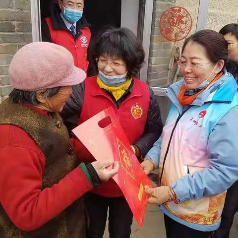 莱州慈善义工爱心公益服务部和莱州正大光明眼科医院送温暖活动