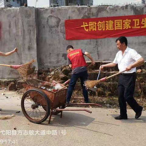 9日上午，第七网格气象局深入责任区开展环境大清扫活动及逐户发放宣传资料